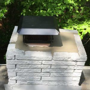 Repointing, crown resurface, chimney chase build, cap install