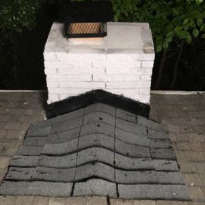 Repointing, crown resurface, chimney chase build, cap install